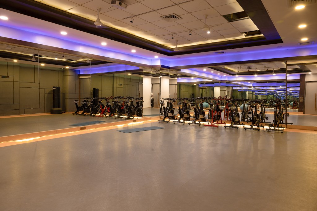 Studio with Spinning Cycles Mirror for Yoga Calisthenics Meditation